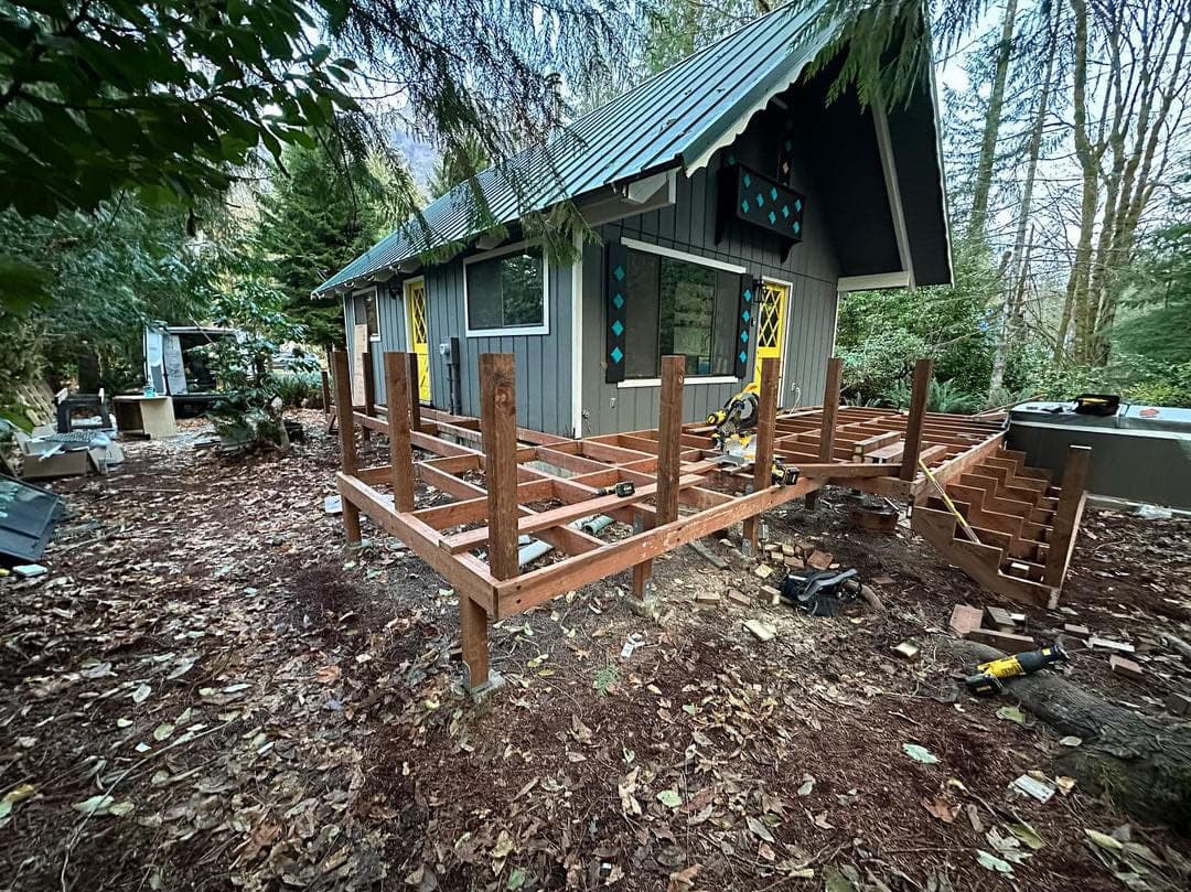 The frame of a newly added back porch that gives easy access to the hot tub