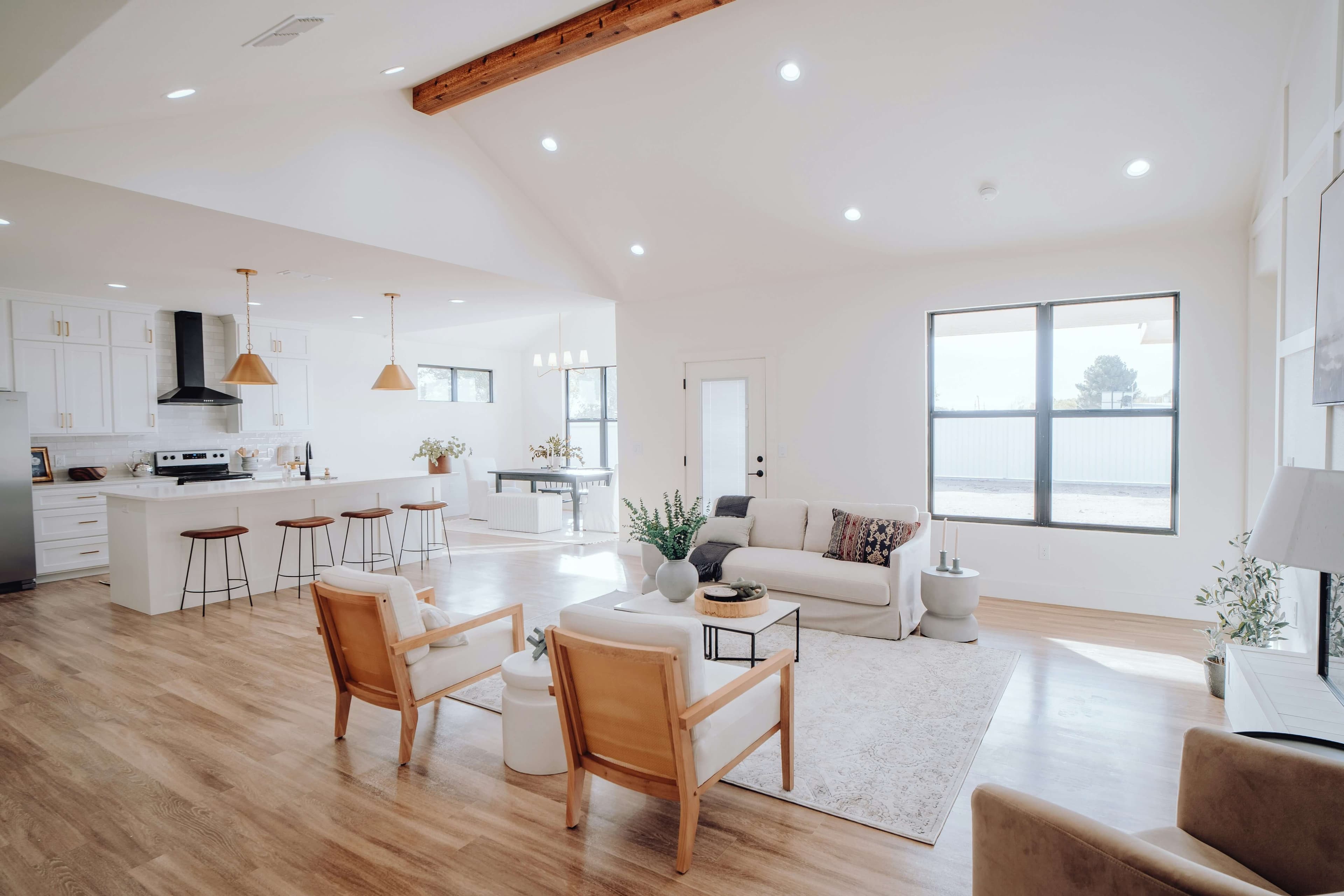 Open floor plan with a large living room and kitchen